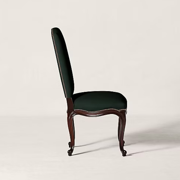 A classic high-back dining chair with dark green upholstered seat and backrest, featuring nailhead trim and carved dark brown wooden cabriole legs, shown against a plain light gray background.