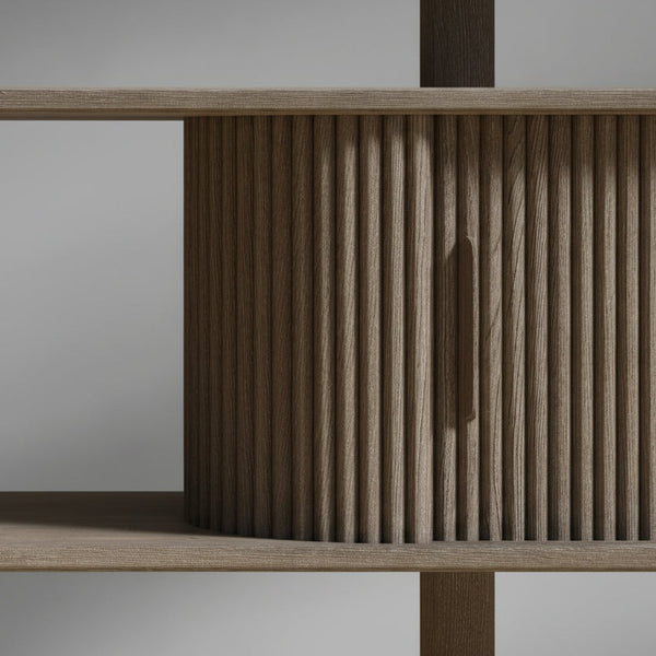 Wooden furniture piece with a textured cylindrical design on a plain background