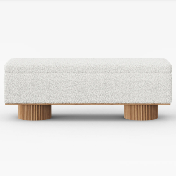 White textured bench with wooden legs on a white background