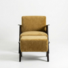 A modern armchair with a matching ottoman, upholstered in a textured mustard yellow velvet fabric with dark wood arms and legs, shown against a plain white studio background.