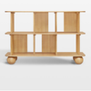 Wooden shelf with wheels on a white background
