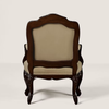 A classic French provincial style armchair with a dark brown carved wood frame and beige upholstered seat and backrest, shown from the back against a neutral studio background.
