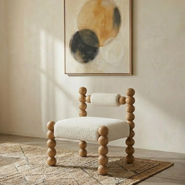 modern chair made up of solid wood and boucle fabric