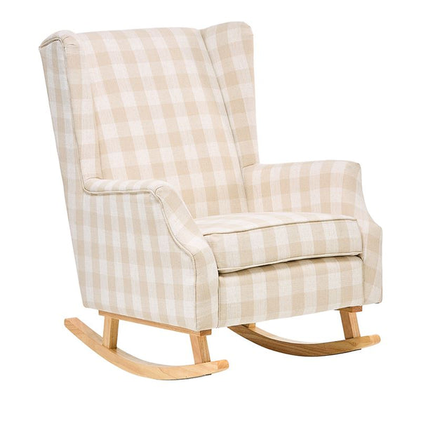 Beige checkered kids rocking chair with wooden base in a cozy minimalist nursery room.
