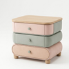 Stackable storage boxes with pastel colors on a white background