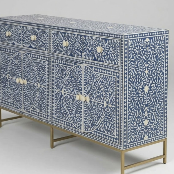 Decorative cabinet with blue and white pattern on a gray background