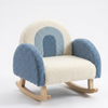 Rocking chair with blue and beige patterned backrest on a white background