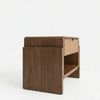 Wooden side table with a drawer on a white background