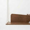 Wooden shelf with a white background