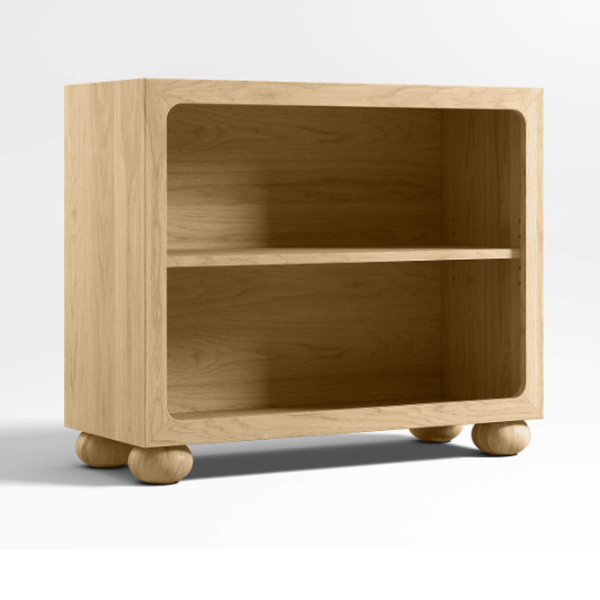 Wooden bookshelf with round legs on a white background