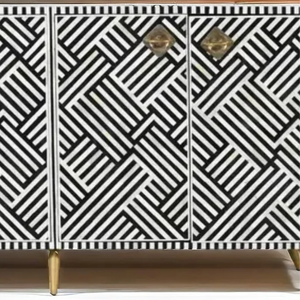 Cabinet with black and white geometric pattern and gold accents