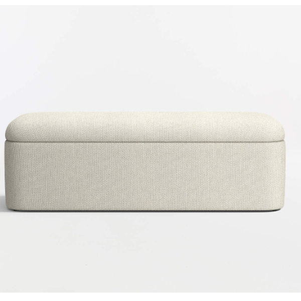 Beige fabric ottoman on a white background