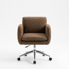 A mid-century modern armchair with textured brown bouclé upholstery and a chrome five-star swivel base with casters, shown against a plain white studio background.