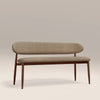Beige bench with wooden legs on a plain background