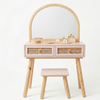 Wooden vanity table with mirror and stool on a white background