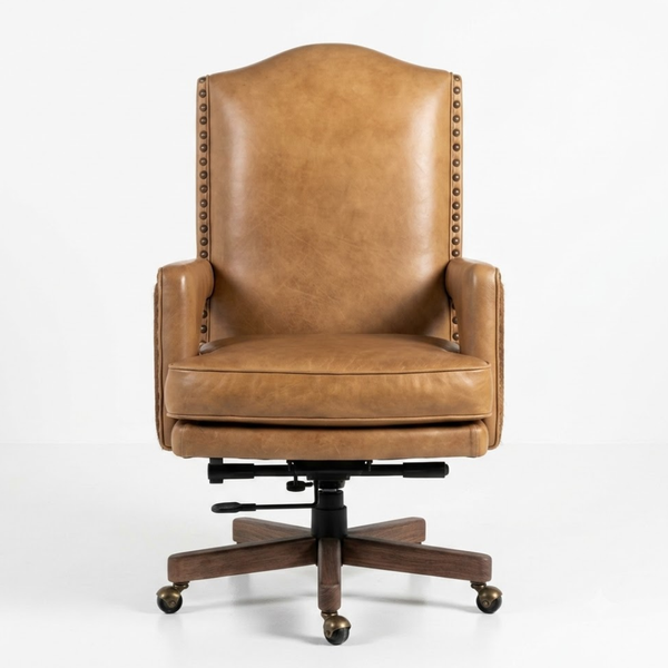 A tan leather wingback office chair with nailhead trim and a dark wood five-star swivel base on a light gray background.