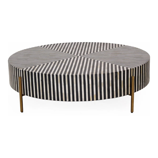 Round coffee tablewith black and white striped pattern and gold legs on a white background