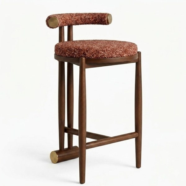 Wooden bar stool with a red cushioned seat and backrest on a white background