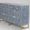 Decorative cabinet with blue and white pattern on a gray background