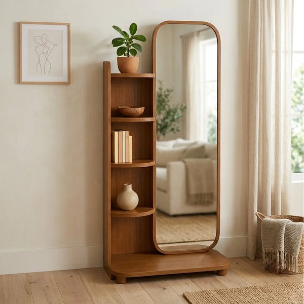Tall wooden shelf with mirror in a room with a plant and framed picture.
