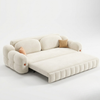 Beige sofa bed with cushions on a white background