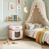 Children's bedroom with pink nightstand, bed with star canopy, and wall decorations.