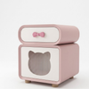 Pink children's nightstand with a cat design on a white background