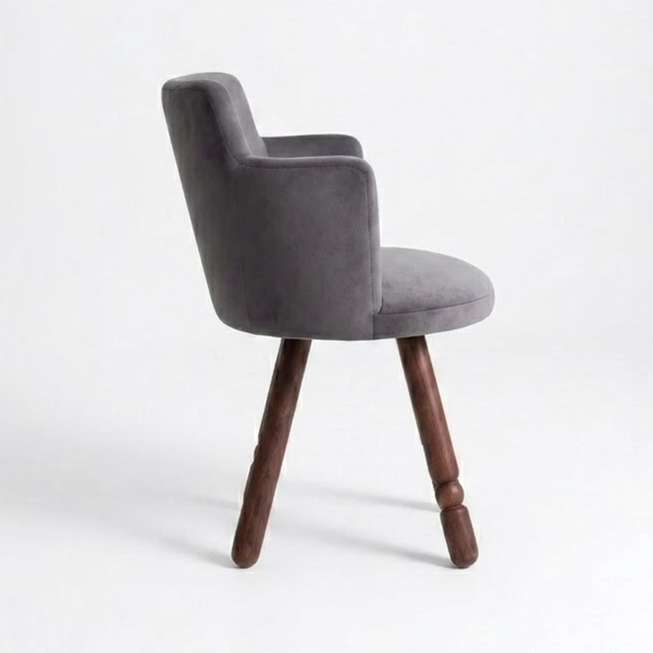 Gray upholstered chair with wooden legs on a white background