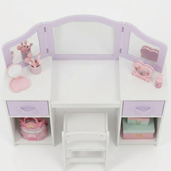 Children's vanity table with mirrors and various accessories on a white background