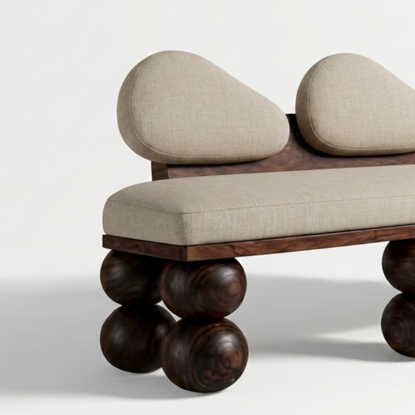 Modern bench with wooden legs and beige cushioned seats on a white background